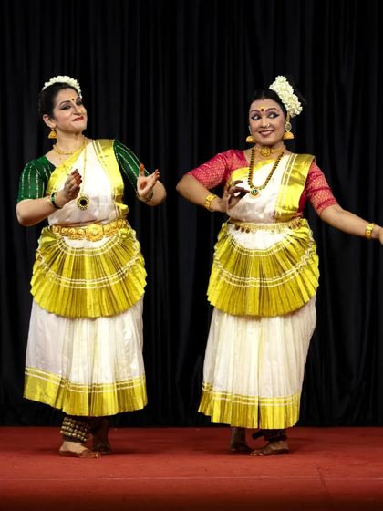The graceful synchronicity of a Mohiniyattam duet, where two dancers move as one.