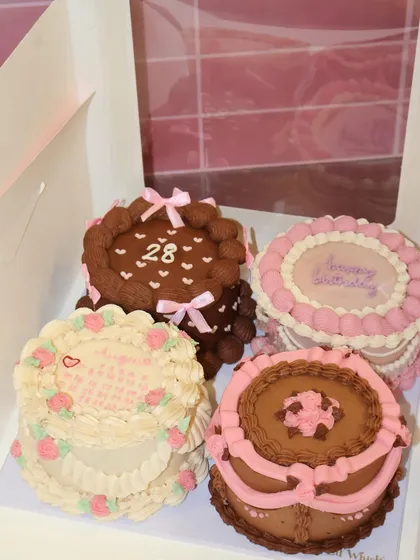 We believe in making celebrations personal and pretty. This set of four vintage-style mini cakes shows how we can create a unique theme for your special occasion, with each cake telling its own sweet story.