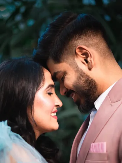 A close-up, intimate portrait with foreheads touching. This classic pose is always full of emotion and connection.