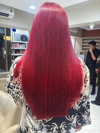 For clients who want to make a statement, a vibrant global color is the perfect choice. I achieved this rich, fiery red that is consistent from root to tip, delivering a bold and confident look with incredible shine.