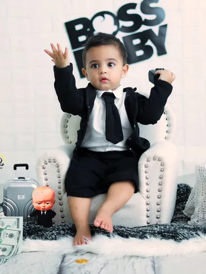 The Boss Baby is in charge. This little one has the perfect commanding pose for this fun and creative themed photoshoot.