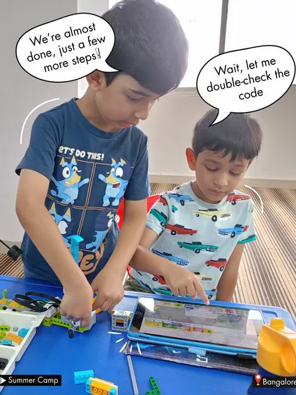 Teamwork makes the dream work. Here, young innovators collaborate, combining their skills in building and coding to solve challenges together at our Bangalore summer camp.