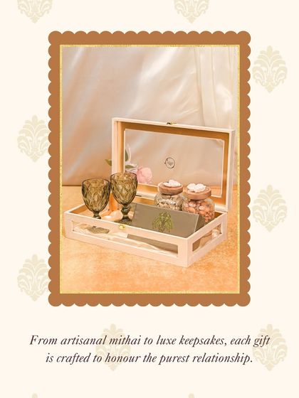 From artisanal mithai to luxe keepsakes, each Rakhi gift is crafted to honour the purest relationship. This wooden box with goblets is a perfect example of that philosophy.