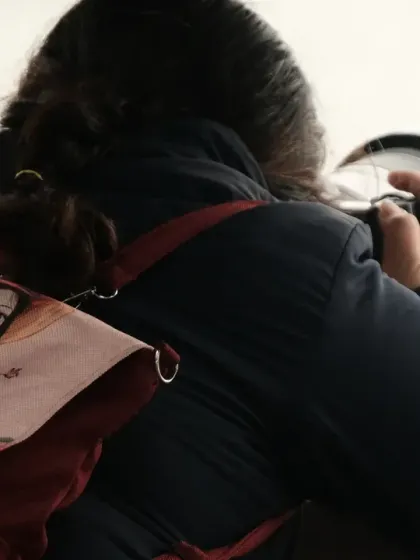 A shot from behind, showing me at work. My camera and I are always on the move, searching for the next frame.