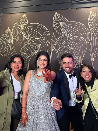 This wedding was an overwhelming experience and this is what clients turning into family truly means. A happy picture with the couple.