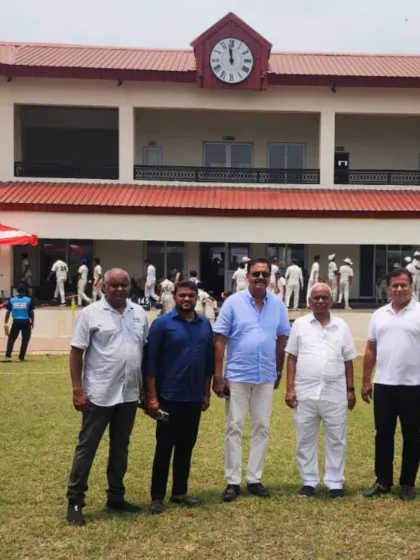 A group photo with the guests in front of the beautiful pavilion at our New Panvel ground.