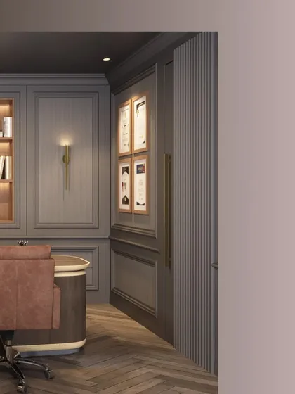 A detail of the custom woodwork and brass hardware in a luxury office space. The fluted paneling and elegant door handle demonstrate our attention to detail in creating a cohesive and high-end design.