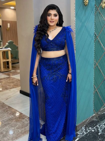 This client is the definition of glamour. The entire look is powerful, confident, and ready for any grand event.