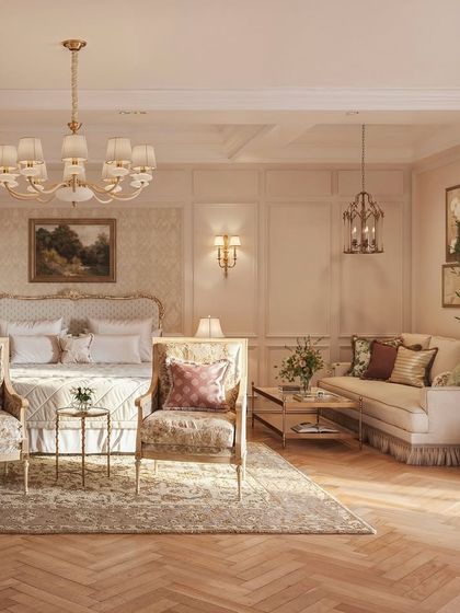 A seating arrangement at the foot of the bed, featuring two ornate armchairs with patterned upholstery. This creates a perfect spot for a quiet morning coffee or an evening conversation, adding another layer of luxury to the bedroom.