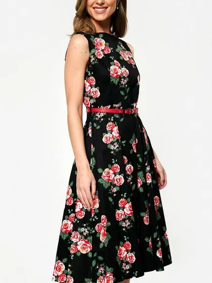 Our black floral A-line dress is a timeless choice for daytime events, brunches, or semi-formal parties. The classic cut is flattering on many body types, and the rose print adds a touch of romantic charm.