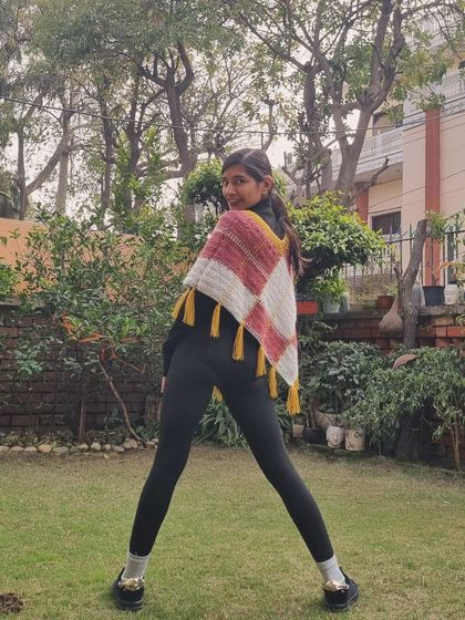 A playful pose to show off the movement and drape of the #PenelovePoncho. It's as fun to wear as it was to make.