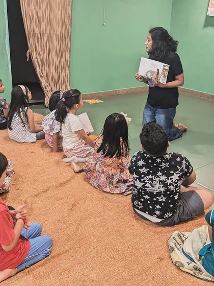 A series of photos from an indoor storytelling session for Pratham Books' 'One Day, One Story' event. This shows my journey as a storyteller, from park sessions to collaborations, and my passion for spreading the joy of reading.