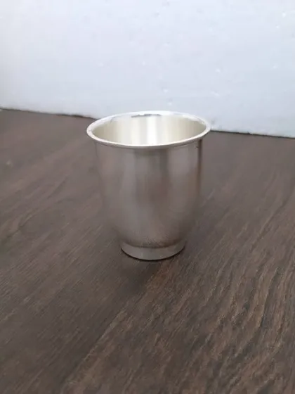 A simple and elegant German silver glass, a must-have for any pooja set to offer water to the deities.