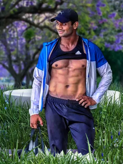 No matter what people tell you, words and ideas can change the world. Outdoor abs shot.