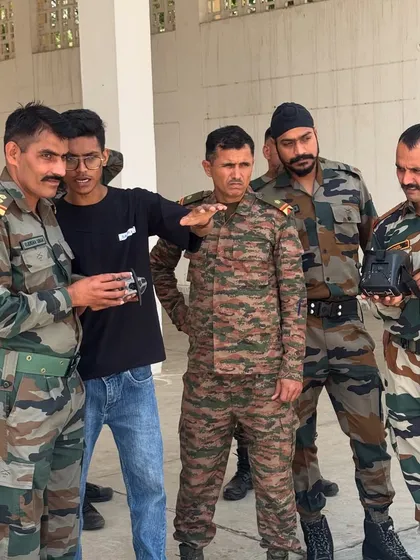 I believe in personal guidance. This moment captures me working directly with soldiers, explaining the nuances of FPV goggles and ensuring they are comfortable and confident with the equipment before their first flight.