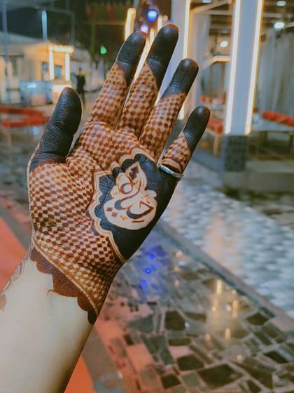 The final stained result of my personalized name design. The dark henna makes the name stand out beautifully.