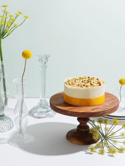 A beautiful two-toned mango cake, showcasing the versatility of our mango creations.