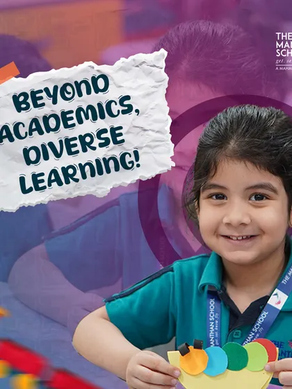 We offer diverse learning experiences that go beyond academics. This happy student is engaged in a craft activity, which is crucial for developing creativity and fine motor skills.