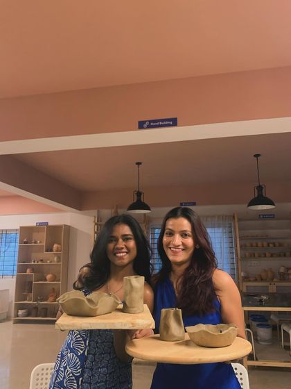 Turning the wheel on friendship and celebration! These friends celebrated a birthday with us, making memories etched in clay.