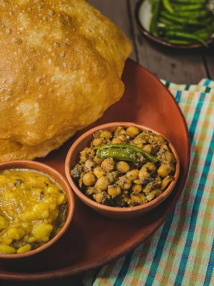 Our Pataka Poori Platter is a weekend showstopper! Fluffy pooris served with classic sitaphal ki sabzi and spicy chole. It’s the taste of home, perfected over 30 years.