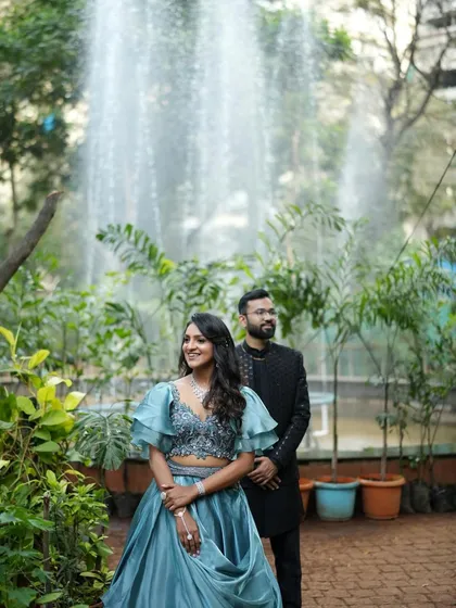 Creating fairytale moments. This couple's shot from their reception shows the bride looking absolutely radiant in her blue gown with soft, romantic makeup.