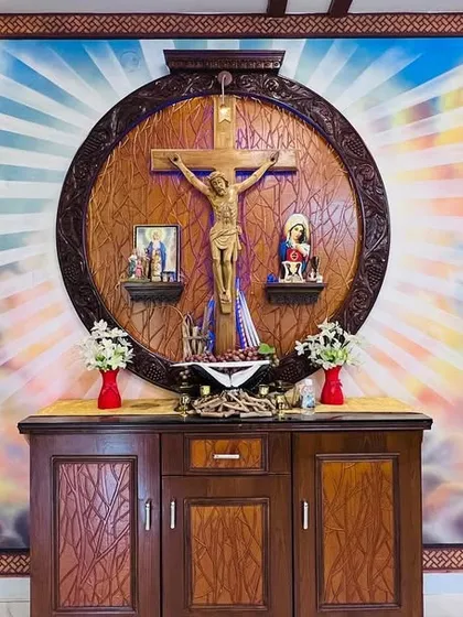 I created this large-scale altar mural for a client's living room, turning their sacred space into a focal point of beauty and devotion. Using spray paint, I blended a celestial background of clouds and divine light to perfectly frame their existing wooden crucifix.
