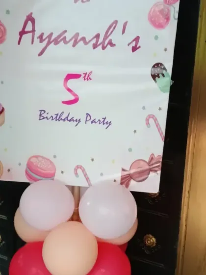 The welcome poster for Ayansh's 5th birthday Candyland party, featuring cute candy and ice cream graphics.