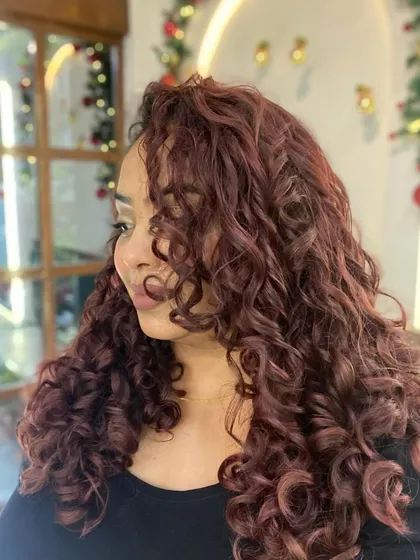 A collection of my other no-bleach balayage and color work, showcasing a variety of tones from subtle browns to vibrant reds on different curl types.