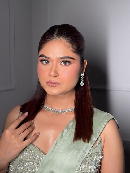 Another angle of this beautiful soft glam. You can see the flawless skin and how the makeup enhances her features without feeling heavy.