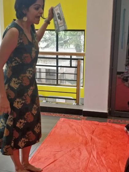 Illustrator Priya Kuriyan beginning her interactive session, instantly connecting with the children.