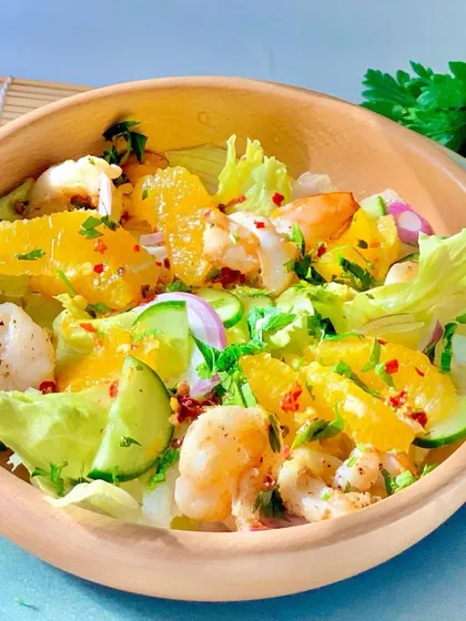 A vibrant Citrus & Prawn Salad from our summer menu. This image highlights the fresh, seasonal ingredients we use to create our delicious dishes.