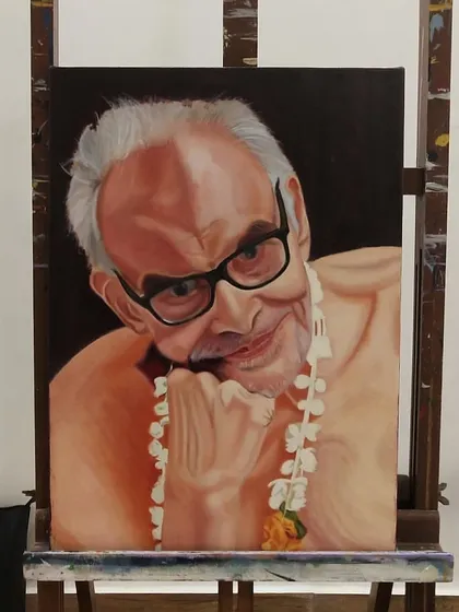 The painting is almost finished. The garland is fully rendered, and I'm doing a final pass on the facial features to ensure everything is perfect.