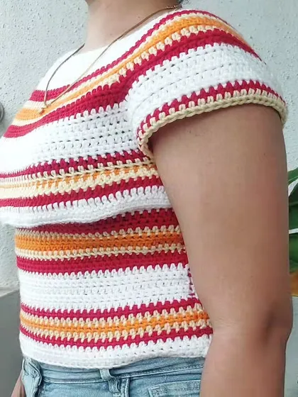 The side view of the Woolie Top highlights the construction of the sleeves and the comfortable fit around the torso.