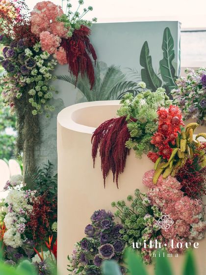 A detail of the floral arrangements on a custom-built structure at the 'Garden of Gaia' event.