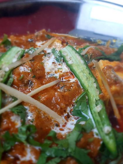 The rich orange gravy of our Paneer Lababdar comes from a blend of tomatoes, spices, and cream.