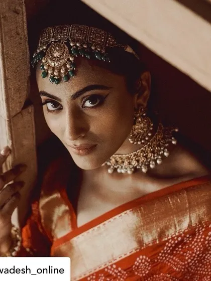 A portrait is about capturing a mood, not just a person. For this heritage fashion lookbook, the focus was on the interplay of light, shadow, and the model's intense gaze to create a feeling of timeless elegance and quiet strength.