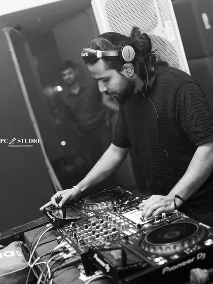 These shots capture me in my element, from different angles and at various events. Each one is a glimpse into my life as a music maker, focused on the craft and connecting with the crowd.