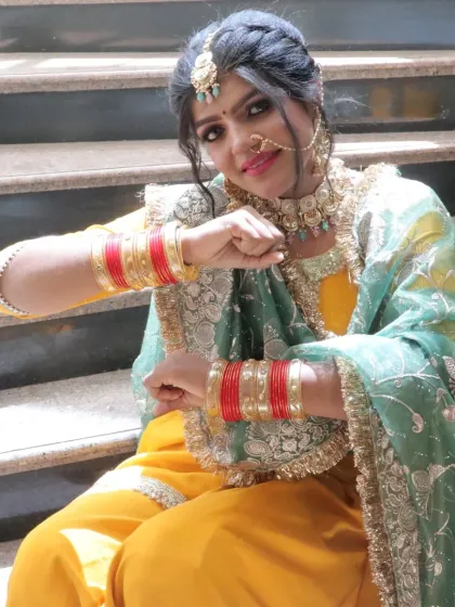 A powerful and confident pose from our Punjabi bride model, showing how the right makeup can empower.
