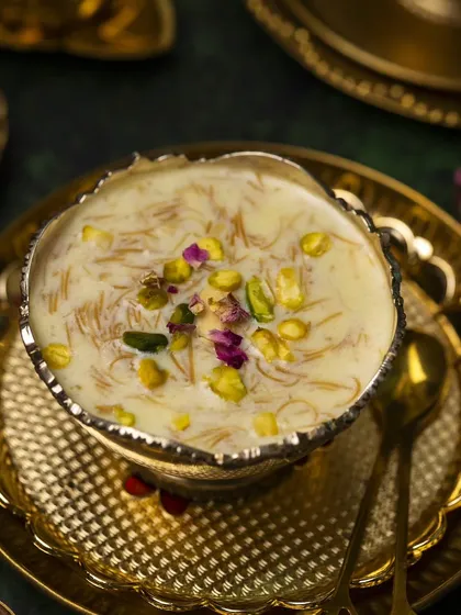 A bowl of Sheer Kurma, a traditional Eid dessert. I use moody lighting and rich props to create an authentic, festive feel for this Indian sweet.
