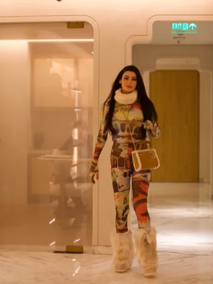 The outfit in motion. This look was designed to be a conversation starter, blending high fashion with a sense of humor and theatricality.