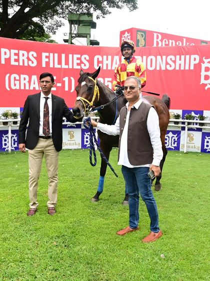 'Diablo' poses for a photo after winning The Justice P. Medapa Memorial Trophy.