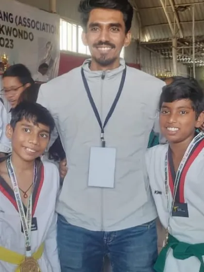 A proud moment with two of my young champions after their wins.
