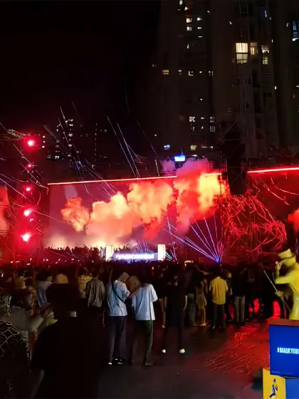 An explosive moment at the Deborah De Luca show, with red smoke and lasers filling the air. Our infrastructure is designed to support these high-impact productions.