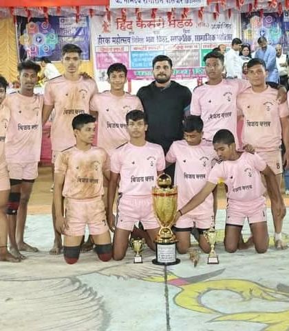 The team with their runners-up trophy, proud of their performance and effort.