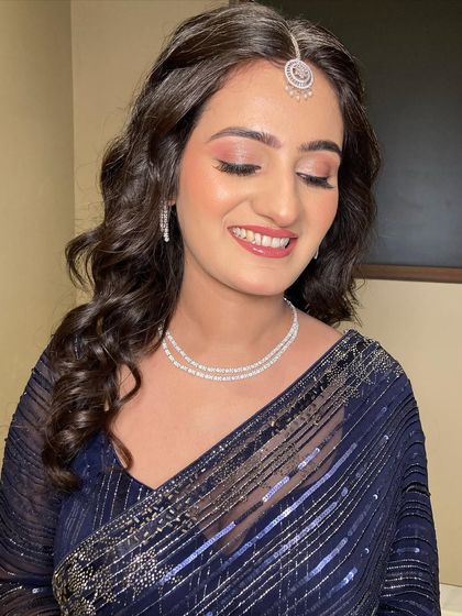 A close-up of the soft eye makeup for Saloni's engagement. A hint of pink and a clean liner are all you need to make the eyes stand out in a subtle, sophisticated way.