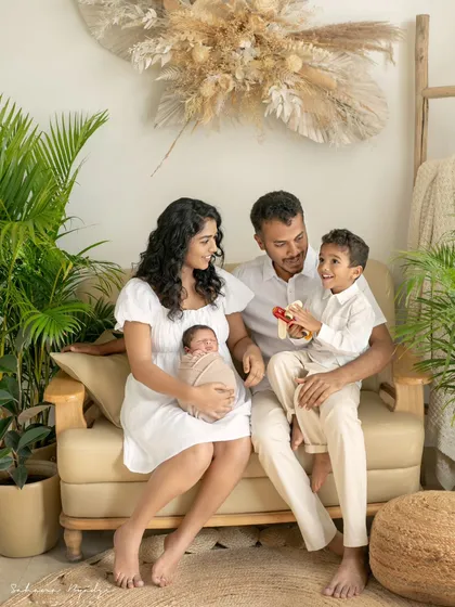 A complete family portrait, full of smiles and happiness. It's so wonderful to capture these moments for families to cherish.