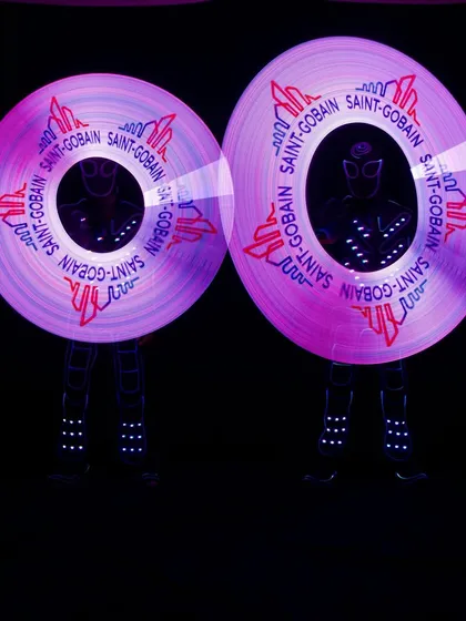 We put your brand in lights. This is our Pixel Poi act, where we program your company logo, brand name, or custom message into a stunning light show, perfect for corporate events and product launches.