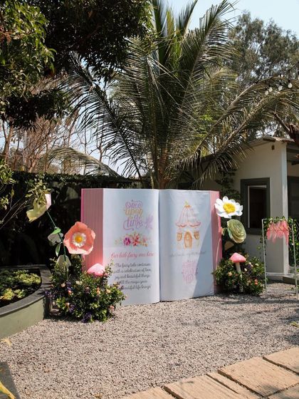 A fairytale-themed decor piece for a birthday party. The giant open storybook creates a magical photo opportunity for guests.