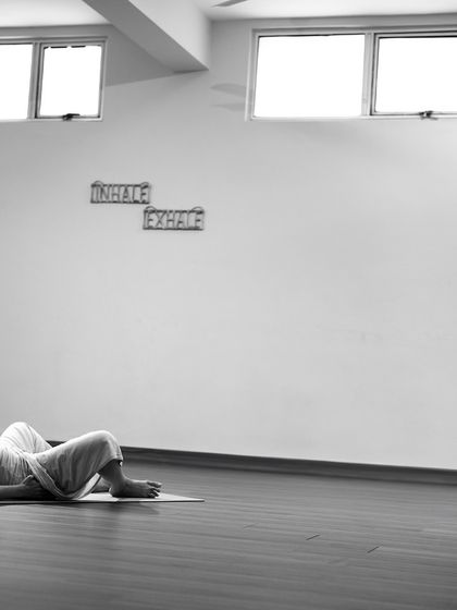 A moment of rest in Savasana within the peaceful container of the shala.