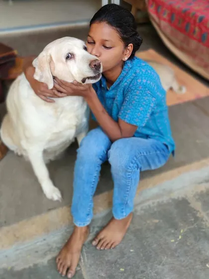 This is me with my inspiration, Whiskey. My journey into baking for dogs started with her, and every treat I make is filled with the same love and care I give her every day.